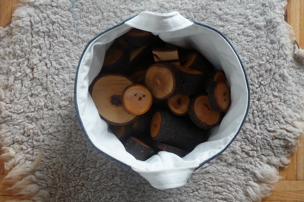 bucket with wood blocks